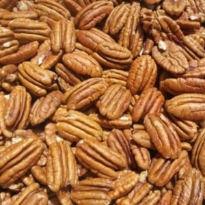 NUEZ MITADES